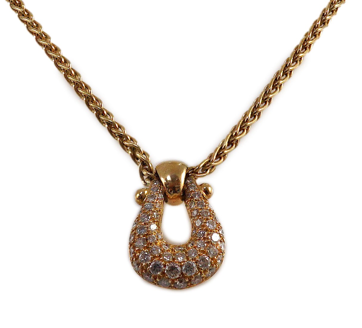 A modern French 18ct gold and pave set diamond 'U' shaped pendant, on a French 18ct gold chain
